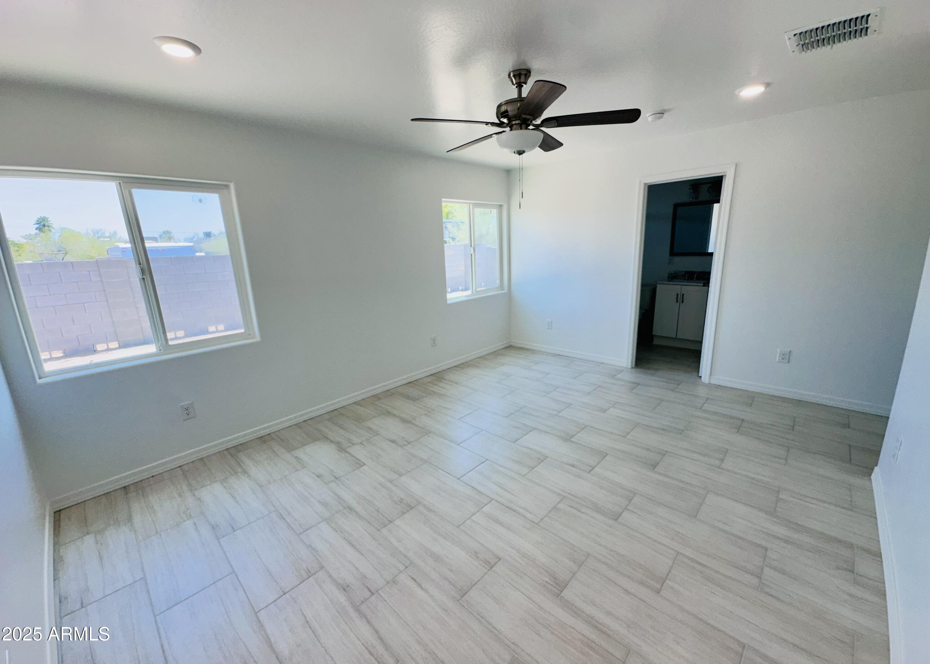 32007 North Bush Street Wittmann, AZ 85361 - Photo 10 of 22 a view of an empty room with a window