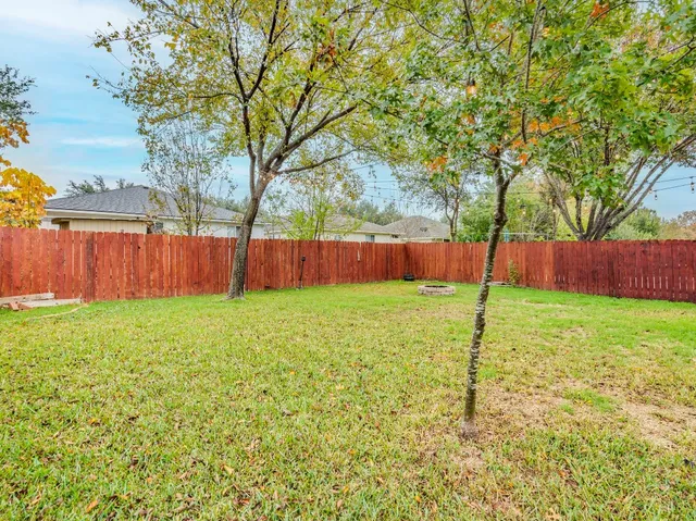 a backyard of a house with a yard