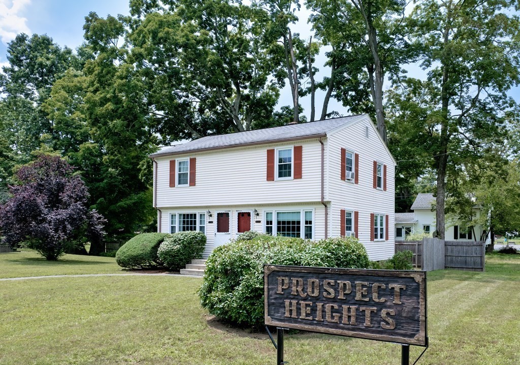 40 Prospect Street, Unit 1B Westfield, MA 01085 - Photo 18 of 24 a view of a house with wooden fence and trees