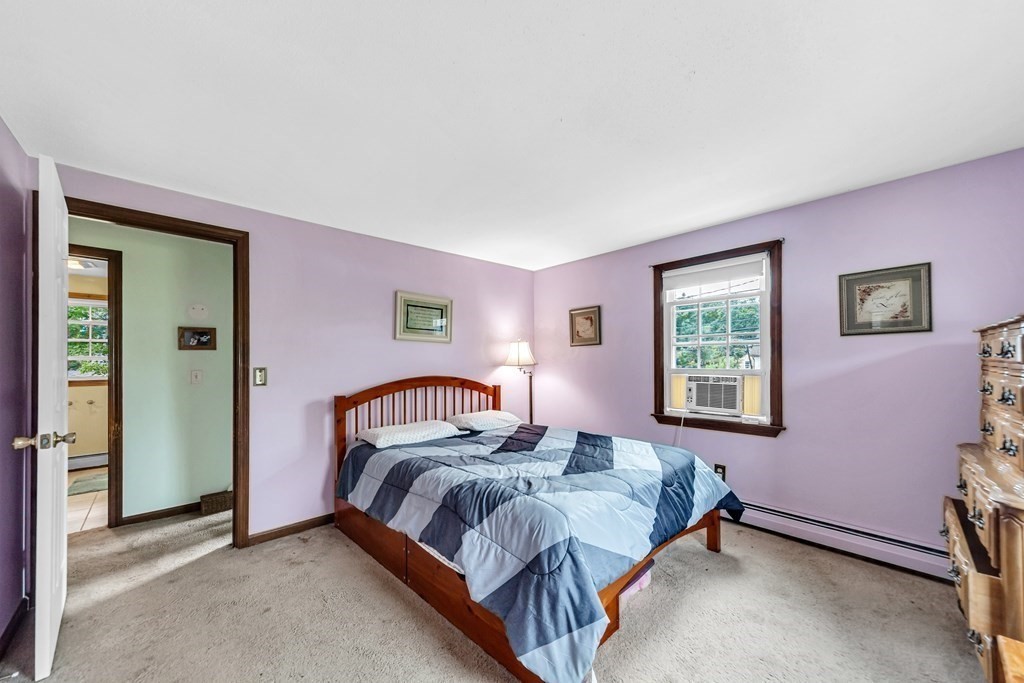 40 Prospect Street, Unit 1B Westfield, MA 01085 - Photo 10 of 24 a bedroom with a bed and a window