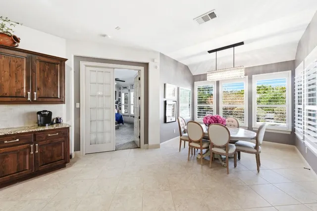 a view of a livingroom with furniture and windows