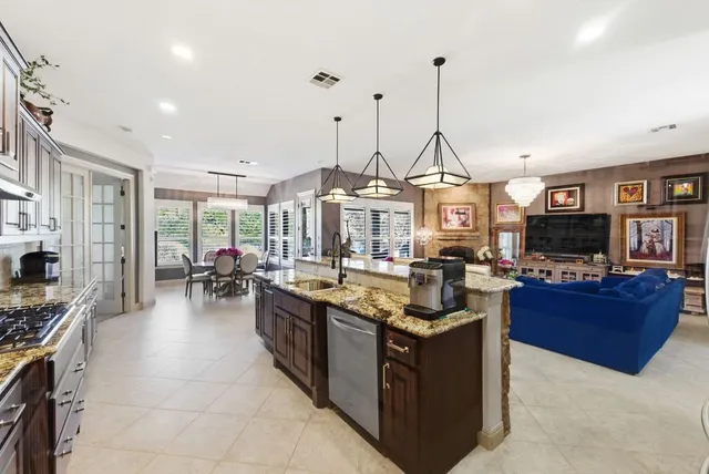 a view of yard with swimming pool and trees