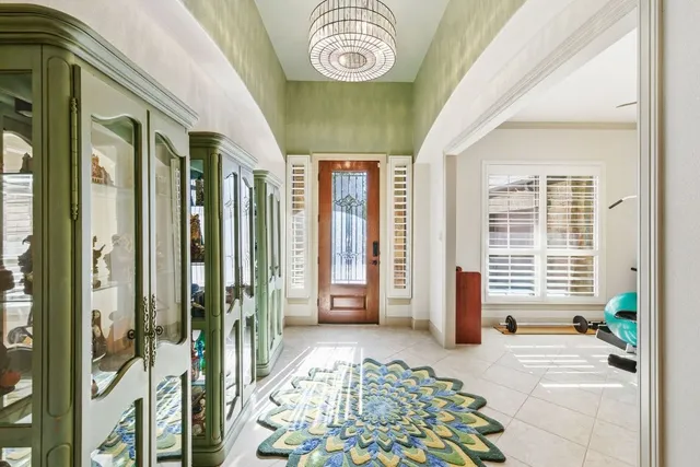 a kitchen with stainless steel appliances granite countertop a stove oven and a refrigerator