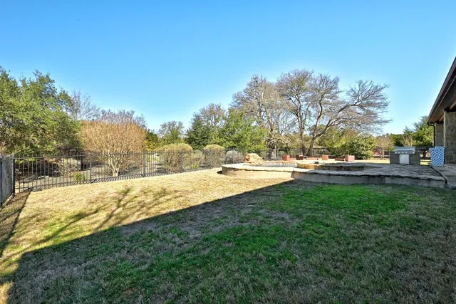 a view of swimming pool with outdoor seating
