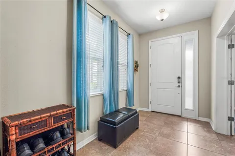 a kitchen with stainless steel appliances granite countertop a stove a sink a oven and a refrigerator