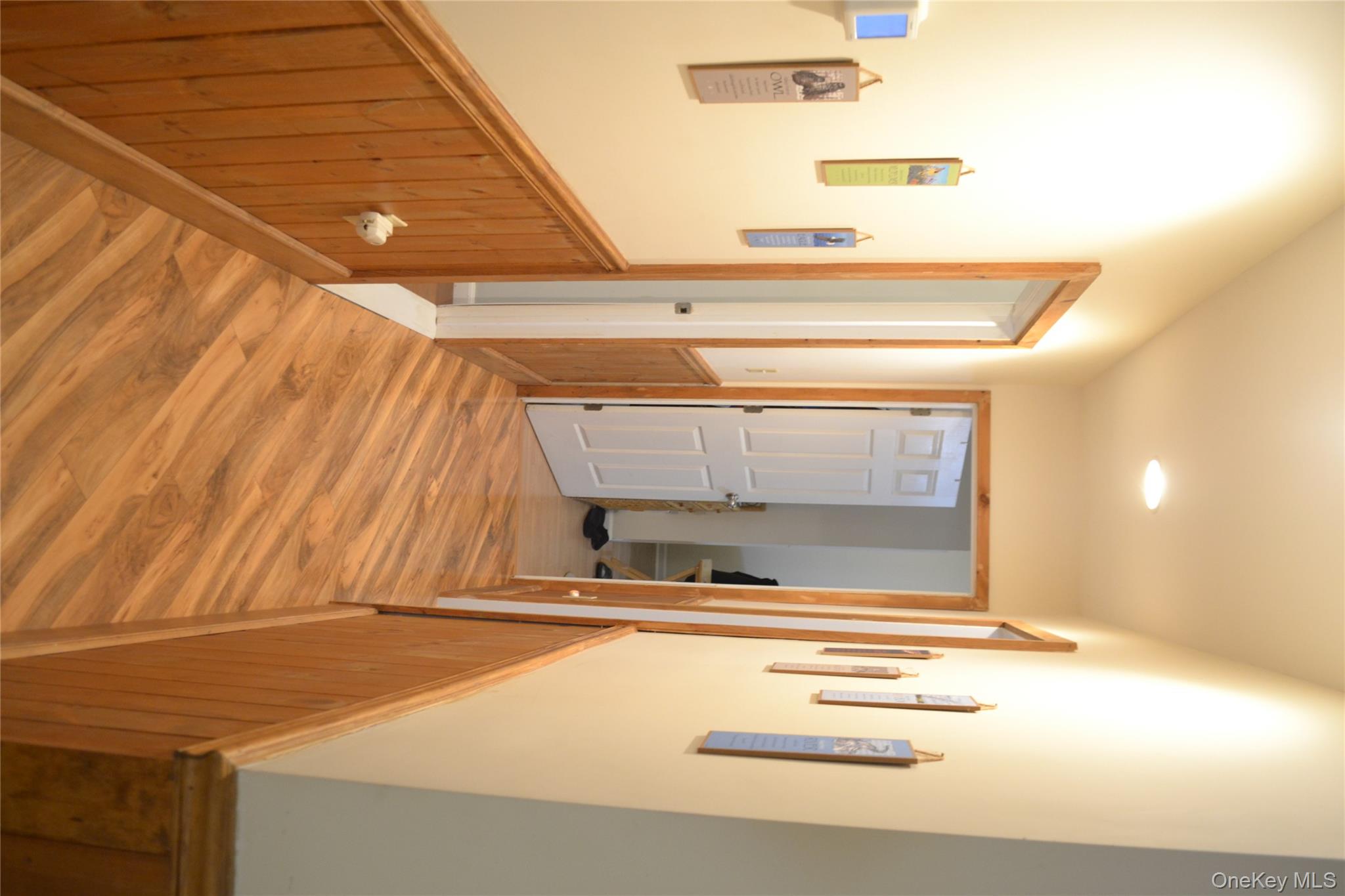 238 Trout Brook Road Roscoe, NY 12776 - Photo 15 of 32 a view of a hallway with wooden floor and staircase