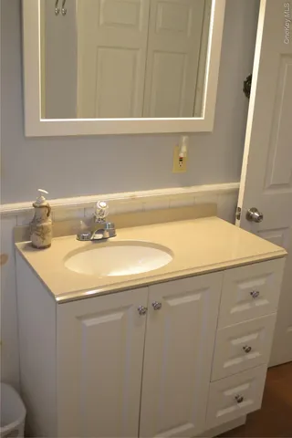 a bathroom with a sink and a toilet
