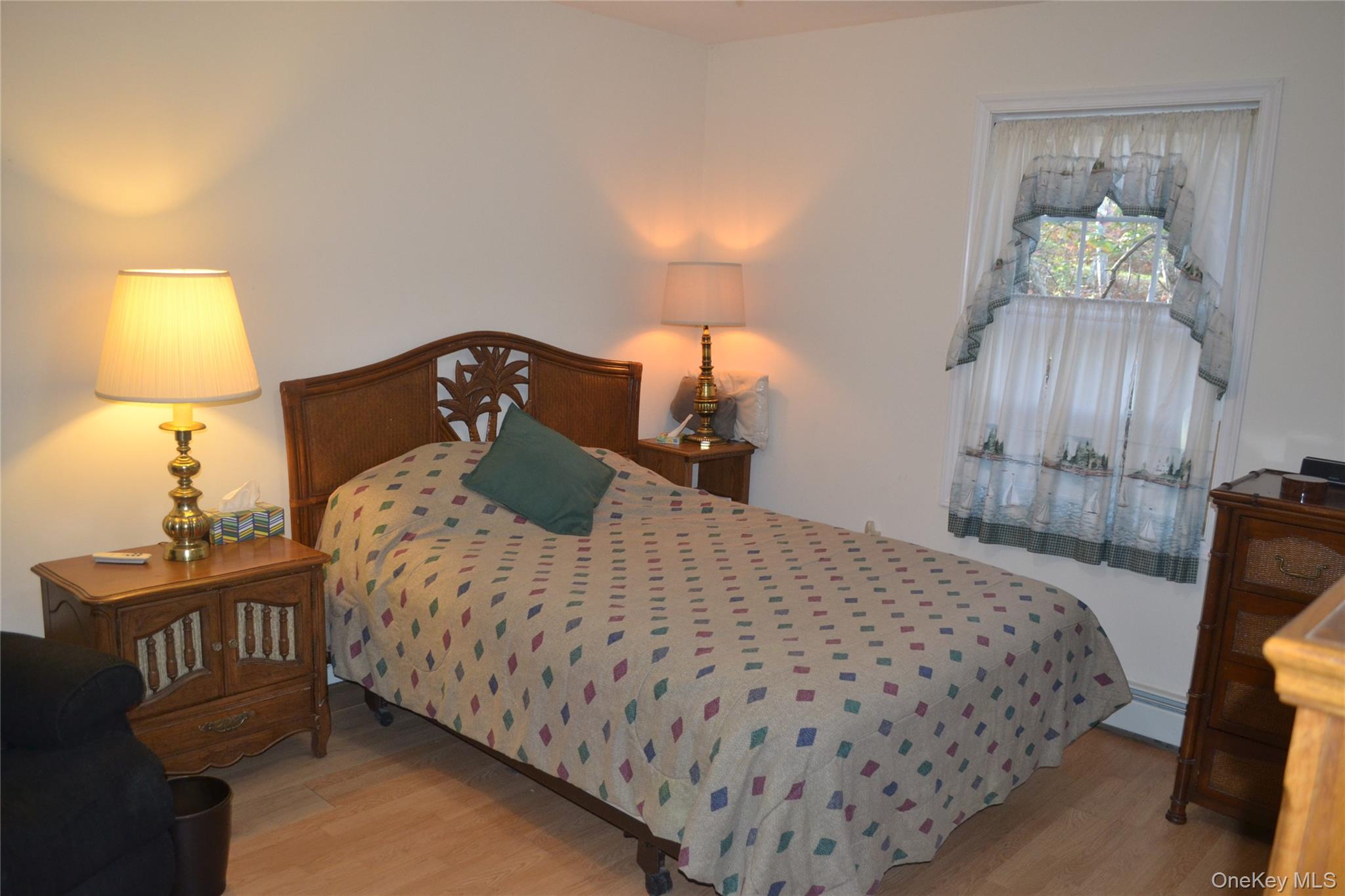 238 Trout Brook Road Roscoe, NY 12776 - Photo 21 of 32 a bedroom with a bed and lamps