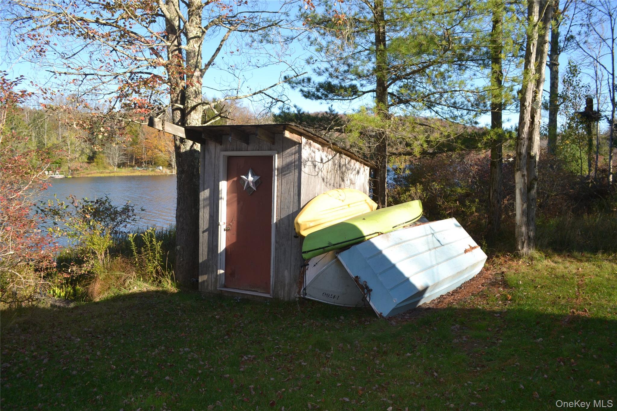 238 Trout Brook Road Roscoe, NY 12776 - Photo 24 of 32 a backyard of a house with table and chairs