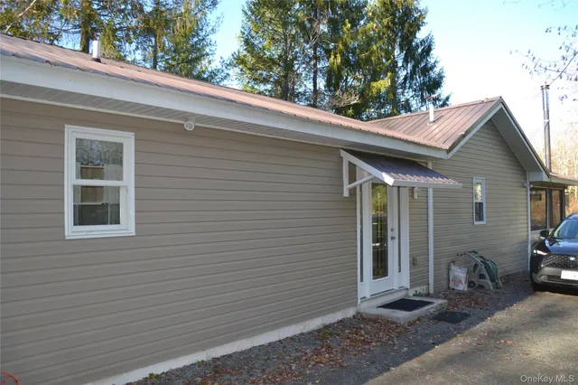 a view of a house with a patio