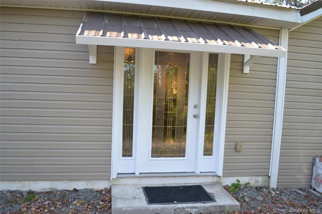 a front view of a house with a garage