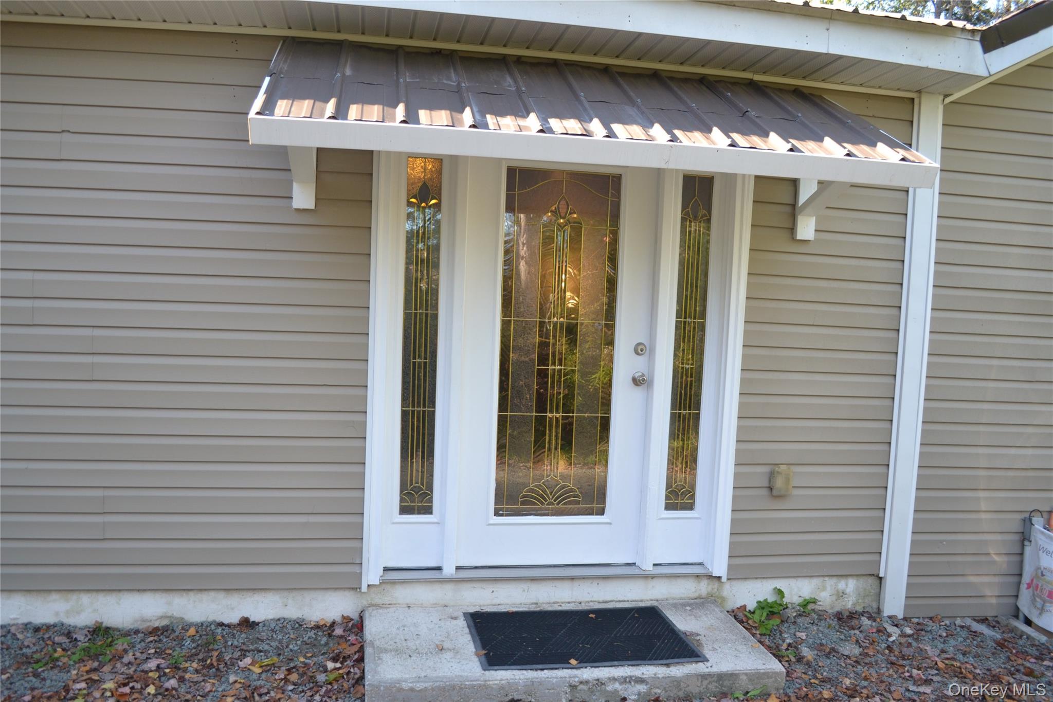 238 Trout Brook Road Roscoe, NY 12776 - Photo 4 of 32 a front view of a house with a garage