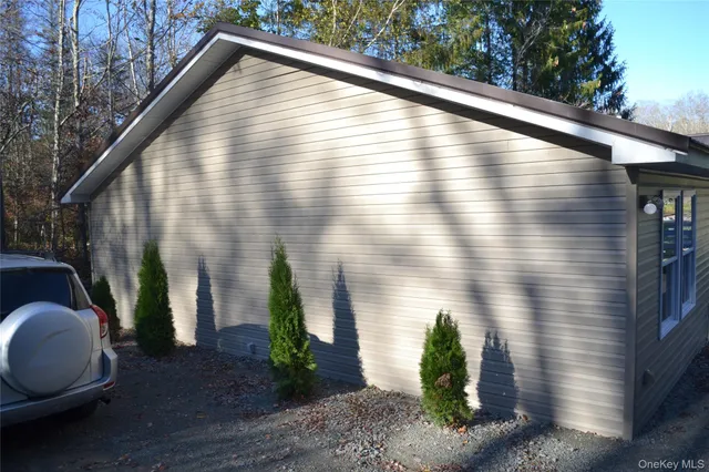 a view of backyard with sitting area
