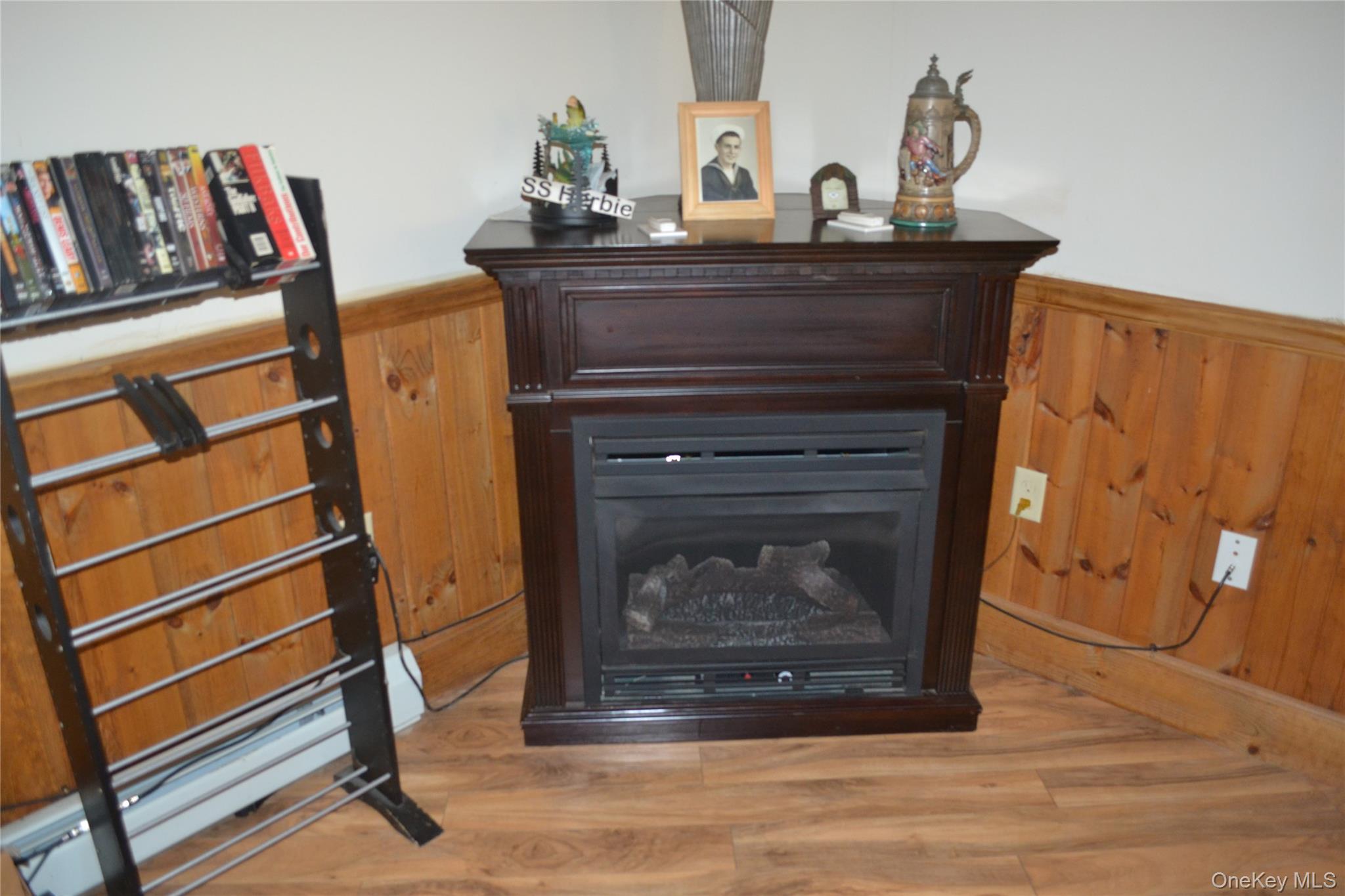 238 Trout Brook Road Roscoe, NY 12776 - Photo 9 of 32 a room with a fireplace and a couch