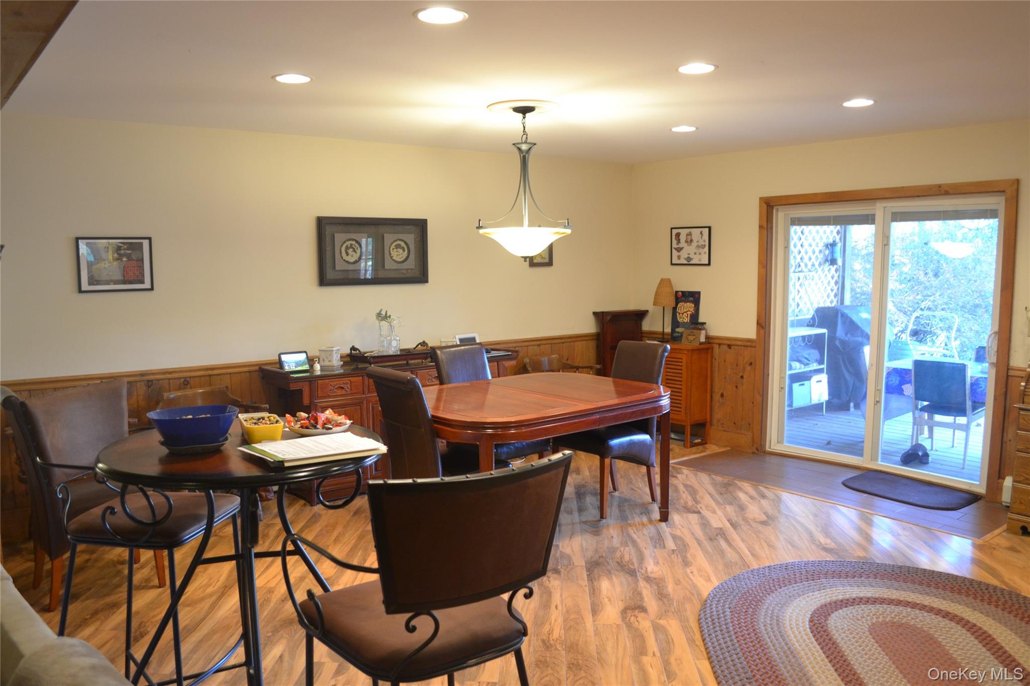 238 Trout Brook Road Roscoe, NY 12776 - Photo 10 of 32 a dining room with furniture a window and wooden floor