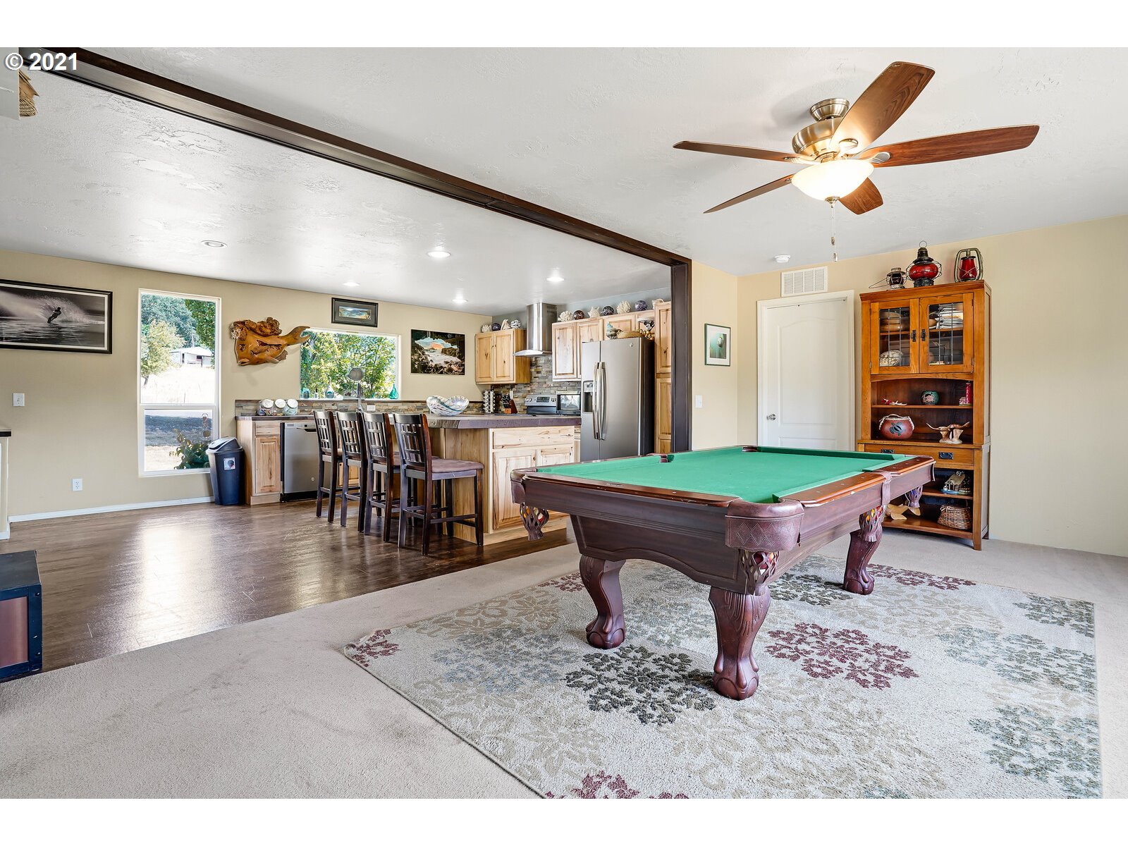 32300 Hidden Valley Road Lebanon, OR 97355 - Photo 12 of 29 a room with lots of wooden furniture and a chandelier
