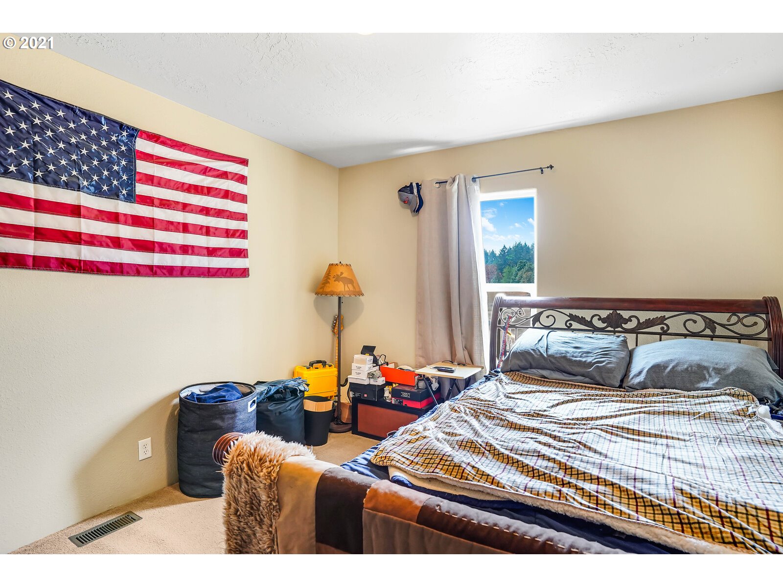 32300 Hidden Valley Road Lebanon, OR 97355 - Photo 17 of 29 a bedroom with a bed and wooden floor