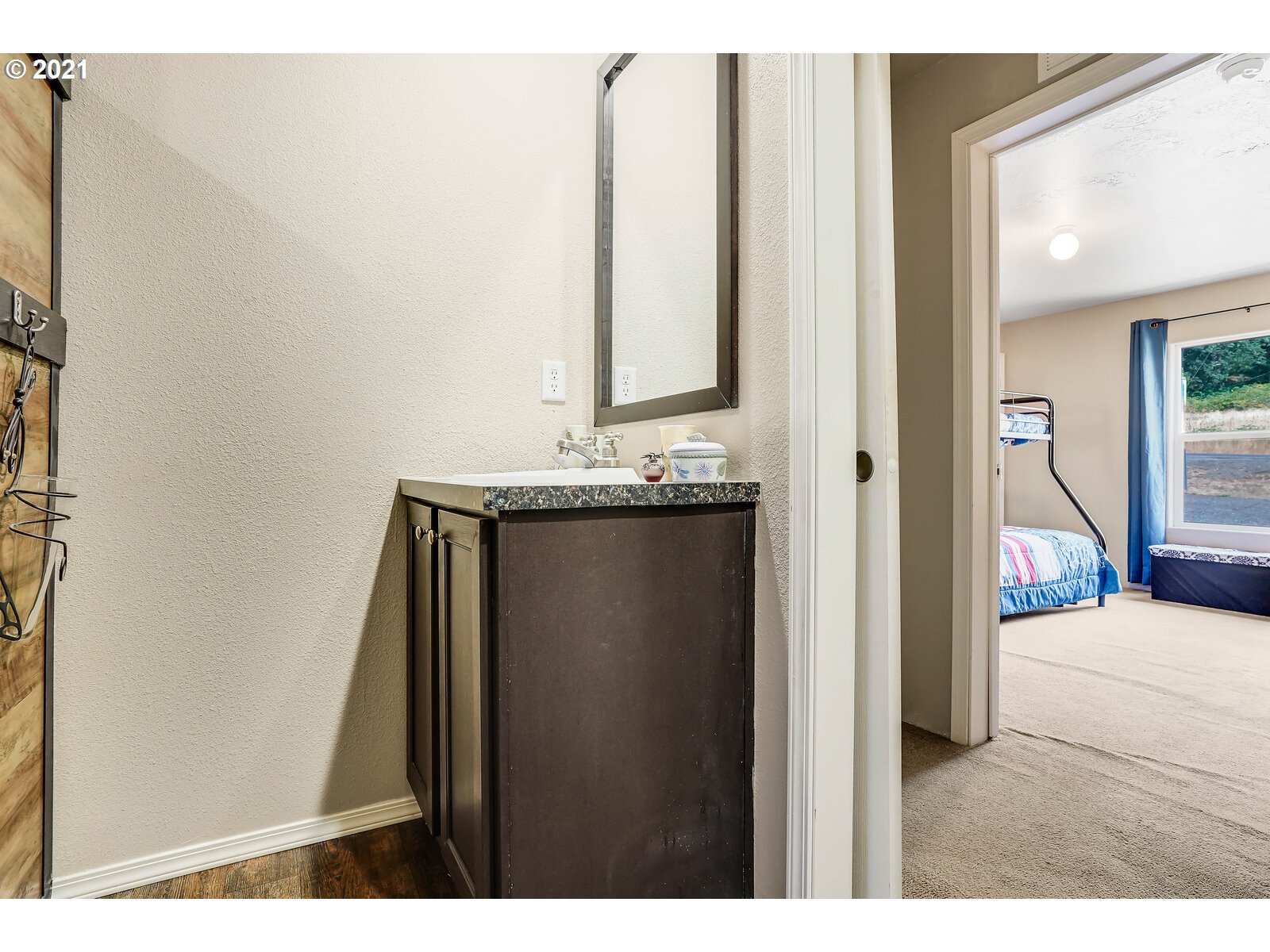 32300 Hidden Valley Road Lebanon, OR 97355 - Photo 19 of 29 a bathroom with a sink and a mirror