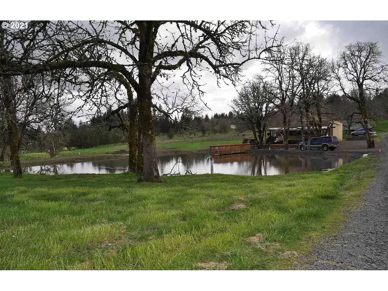32300 Hidden Valley Road Lebanon, OR 97355 - Photo 26 of 29 a view of a yard with a tree