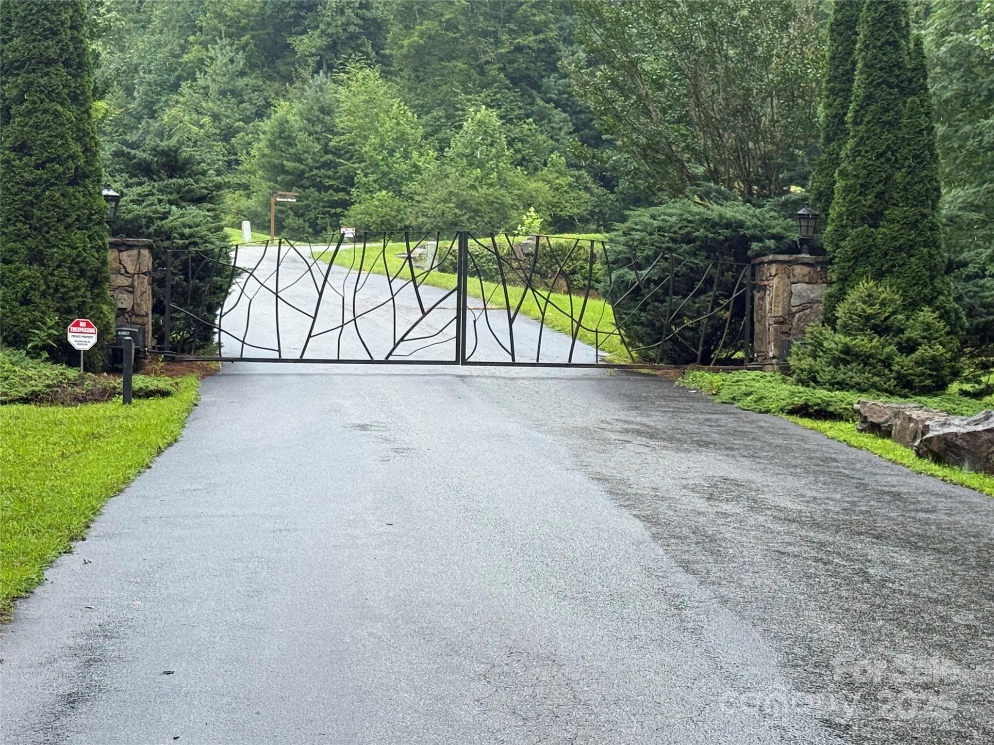 Lot 6 Garnet Road Sylva, NC 28779 - Photo 7 of 9 a view of a street with a yard