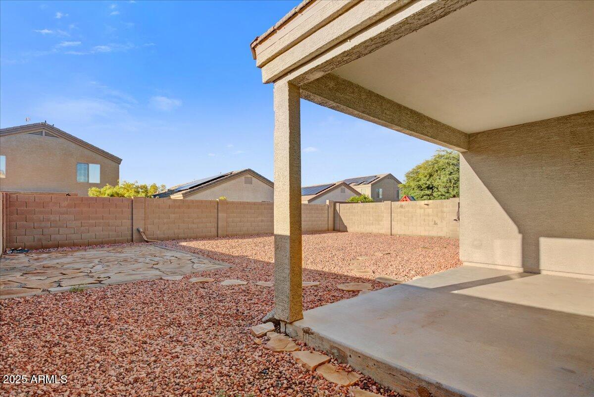 13009 West Port Royale Lane El Mirage, AZ 85335 - Photo 14 of 15 a view of a backyard of a house