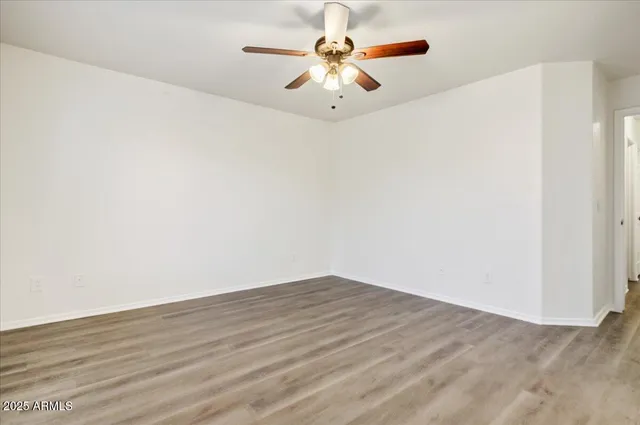 a view of a big room with wooden floor