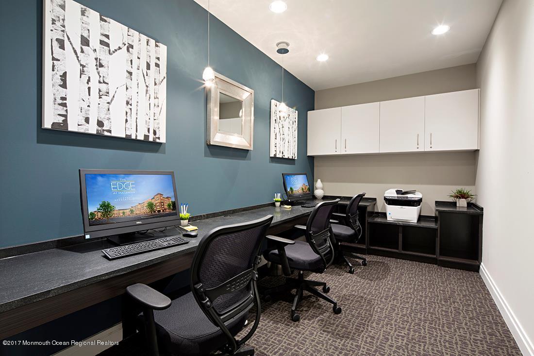 249 Broad Street, Unit 401 Matawan, NJ 07747 - Photo 15 of 27 a view of a workspace with furniture