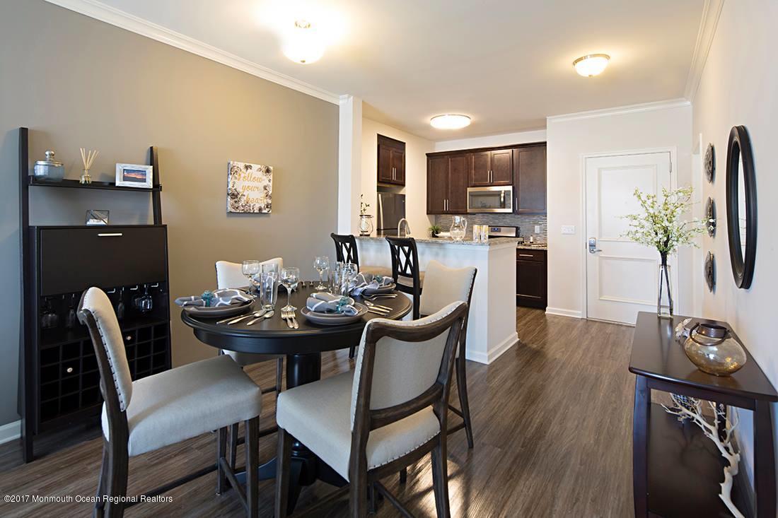 249 Broad Street, Unit 401 Matawan, NJ 07747 - Photo 5 of 27 a dining room with furniture and window