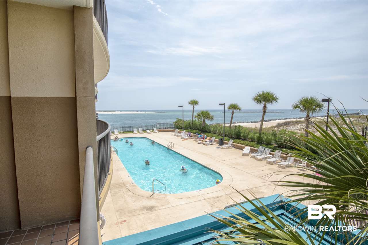 27284 Gulf Road, Unit 213 Orange Beach, AL 36561 - Photo 33 of 40 Oversized pool with an expansive decking.