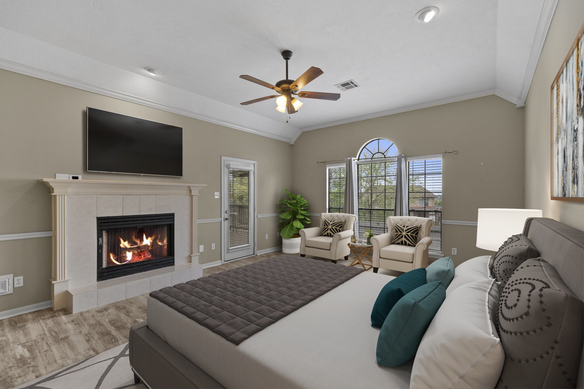 169 April Cove Montgomery, TX 77356 - Photo 12 of 39 Virtually Staged: Cozy fireplace with a classic mantle serves as a warm focal point, perfect for creating an inviting atmosphere during cooler evenings.