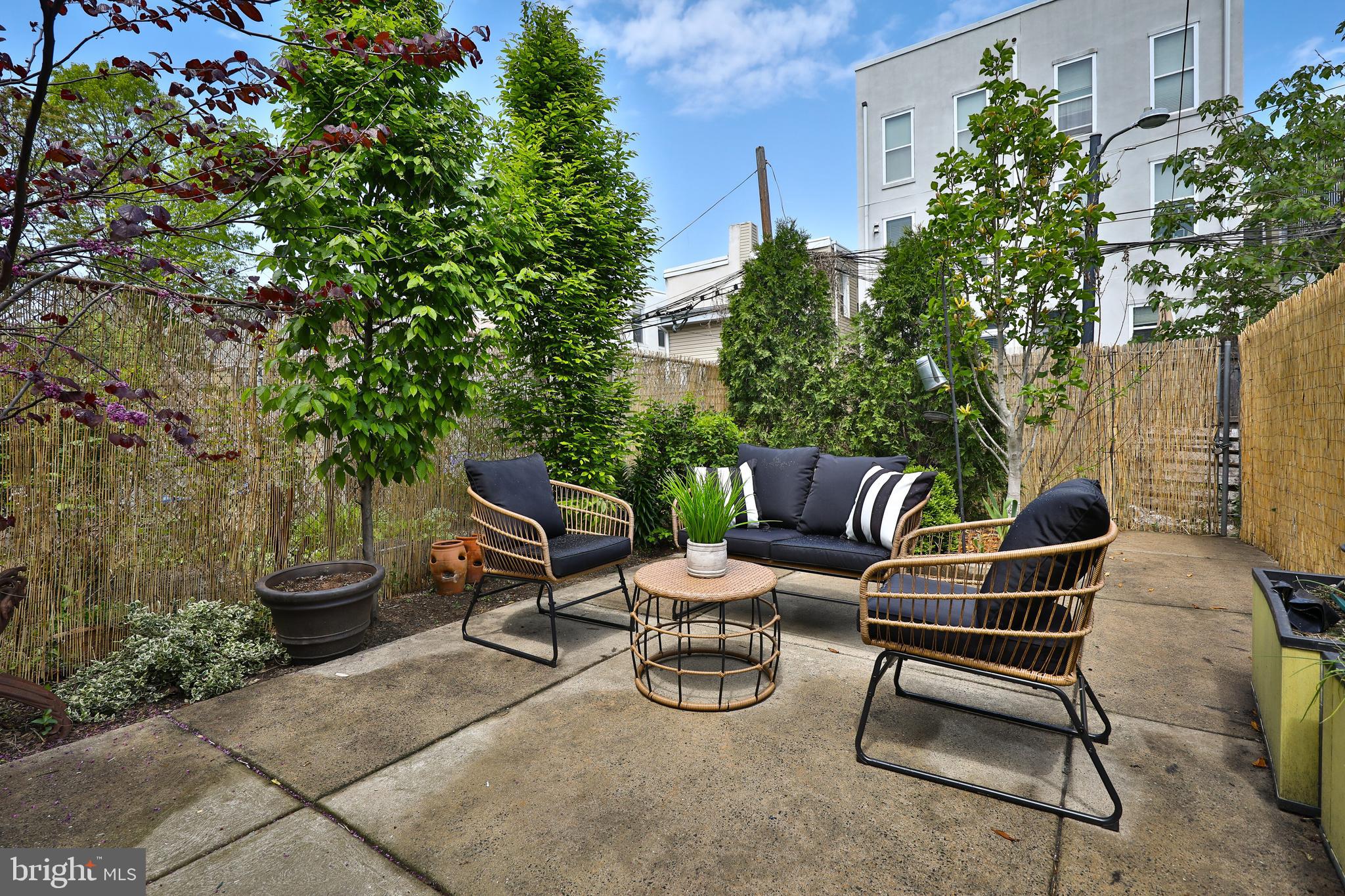 2805 Poplar Street Philadelphia, PA 19130 - Photo 16 of 34 a view of a chairs and tables in the back yard of the house