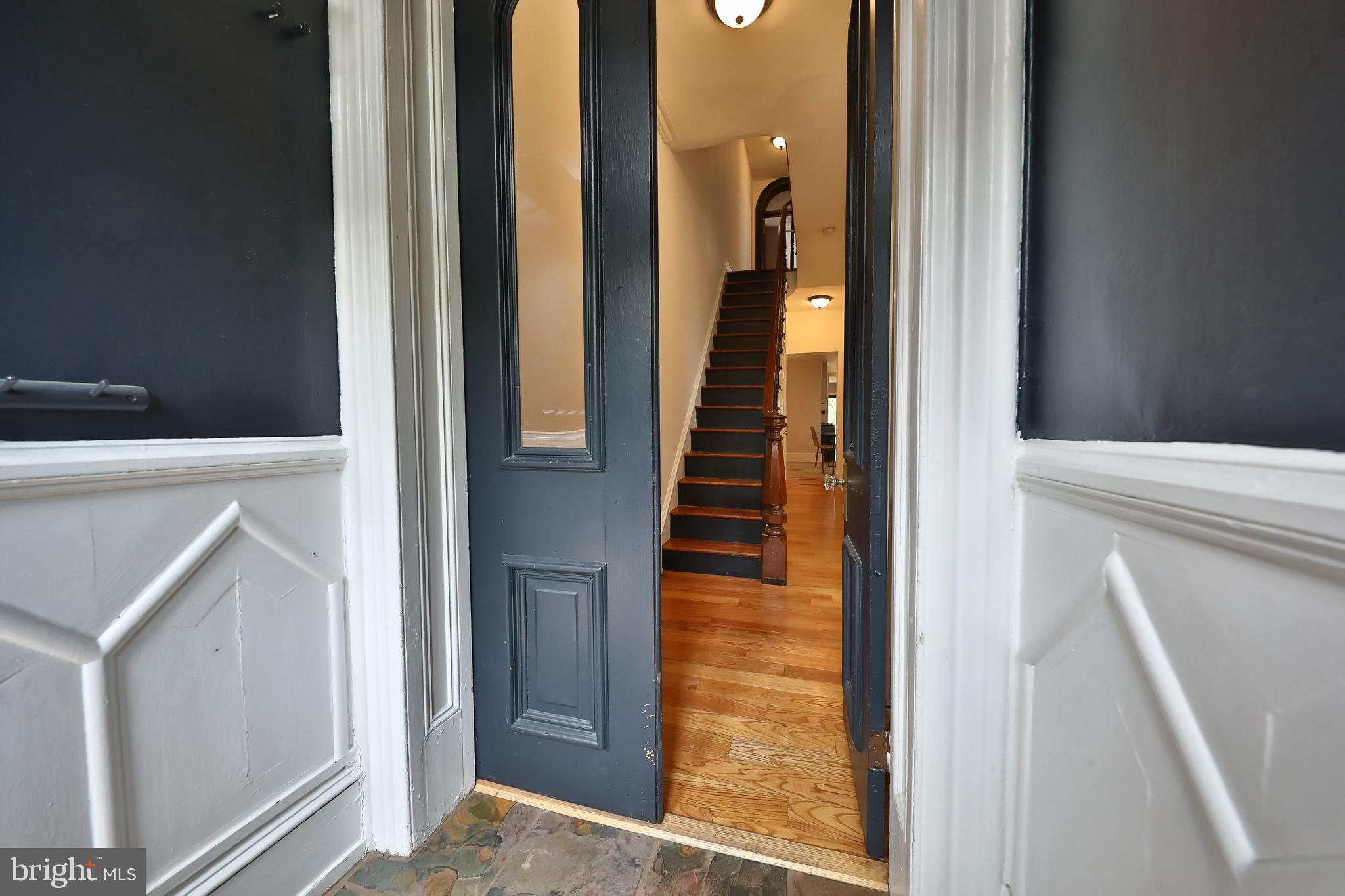 2805 Poplar Street Philadelphia, PA 19130 - Photo 2 of 34 a view of hallway with stairs and wooden floor
