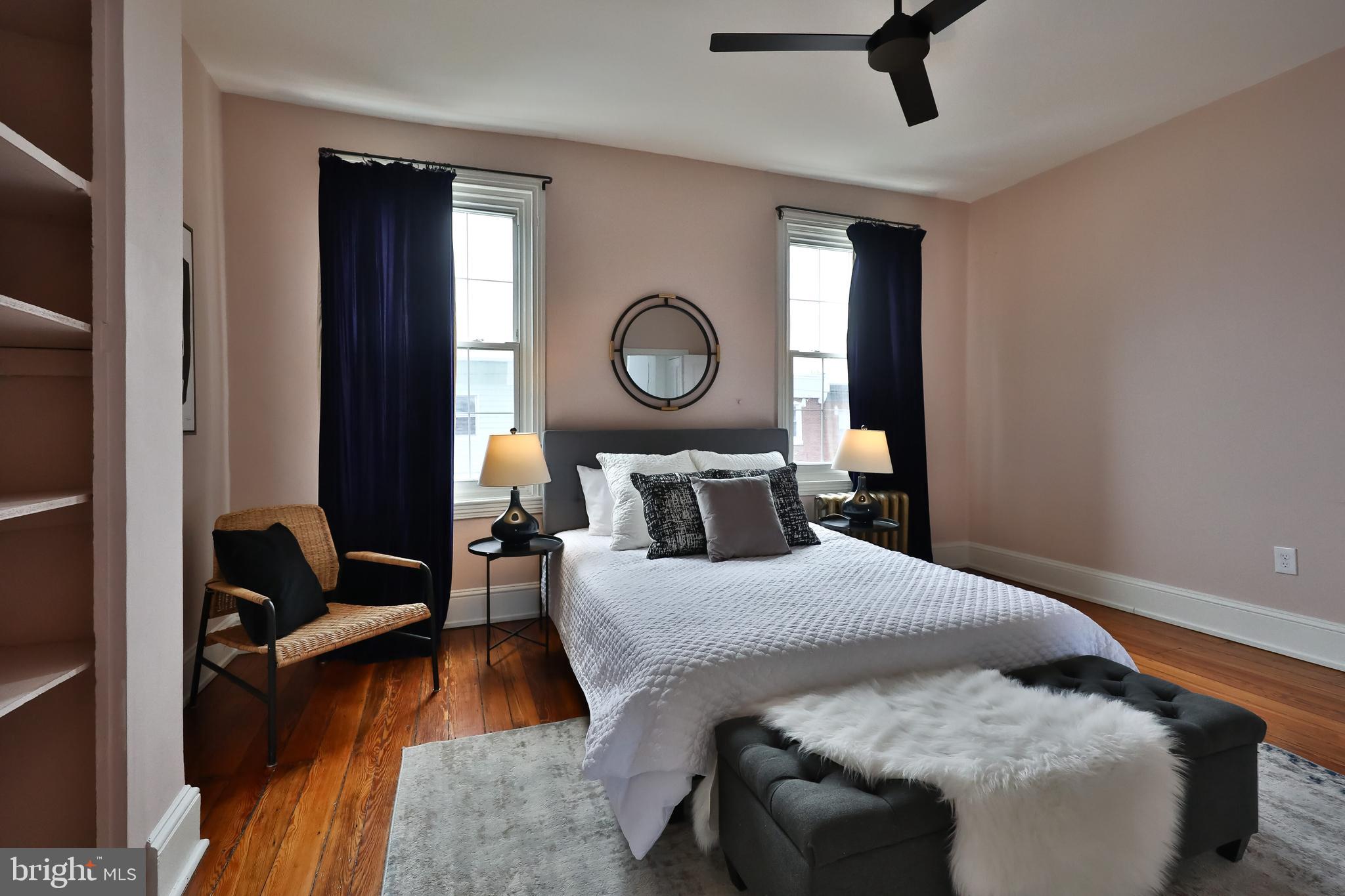 2805 Poplar Street Philadelphia, PA 19130 - Photo 32 of 34 a bedroom with a bed and window