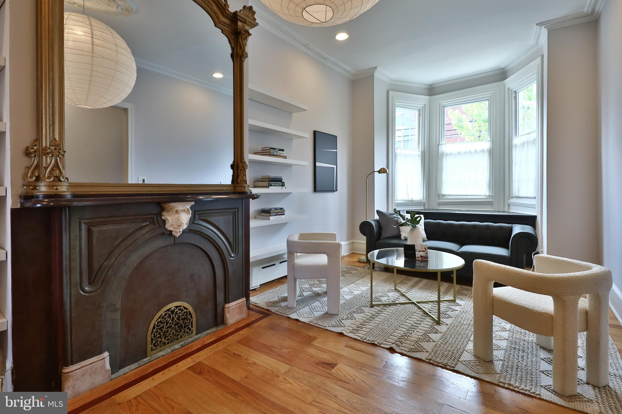 2805 Poplar Street Philadelphia, PA 19130 - Photo 4 of 34 a living room with furniture and a mirror