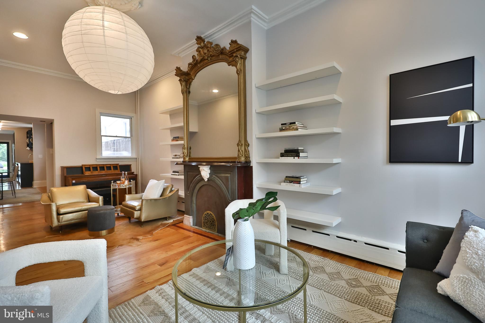 2805 Poplar Street Philadelphia, PA 19130 - Photo 5 of 34 a living room with furniture and a mirror