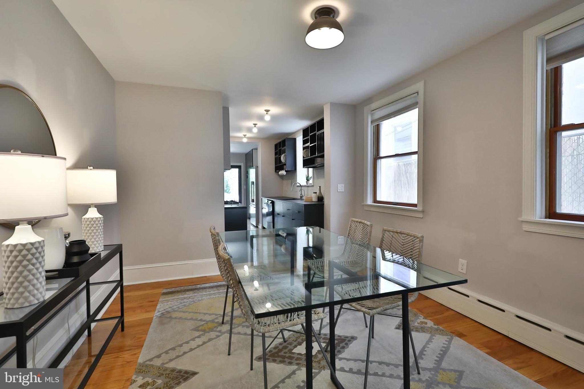 2805 Poplar Street Philadelphia, PA 19130 - Photo 9 of 34 a view of a dining room with furniture and wooden floor