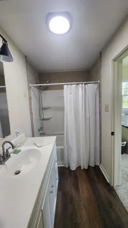 a view of a hallway view with staircase