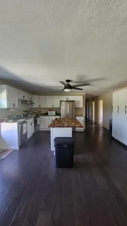 a kitchen with a cabinets and counter top space