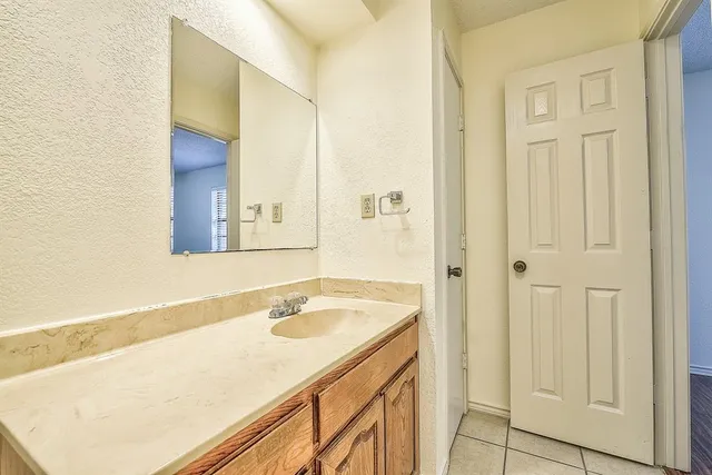 a bathroom with a sink and a toilet