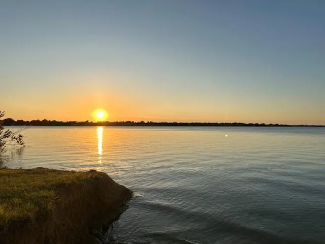 a view of a window and wooden floor