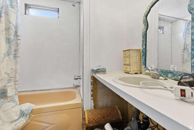 83 West 100 South Virgin, UT 84779 - Photo 21 of 35 Bathroom with shower / bath combo with shower curtain and vanity
