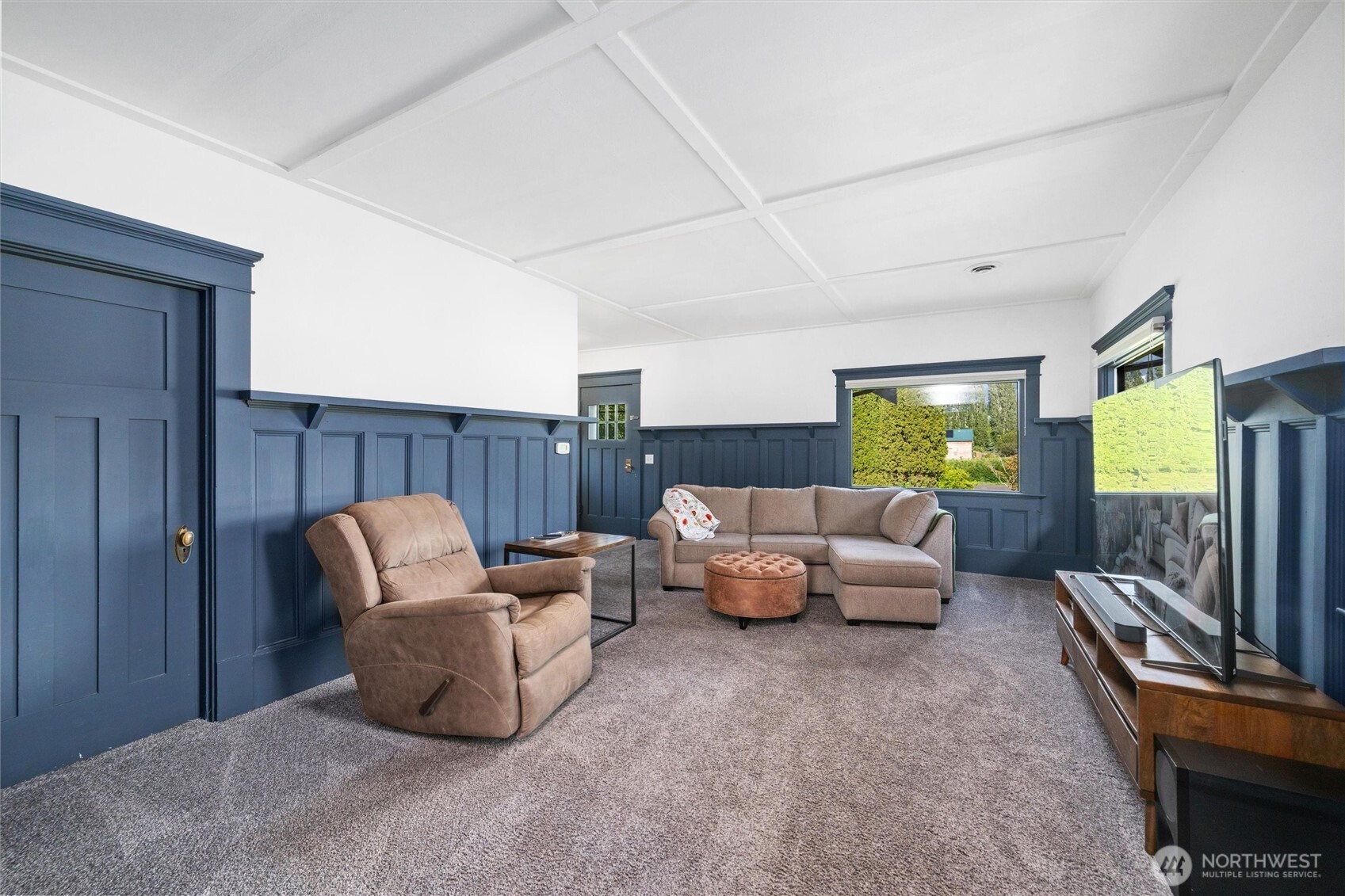 5875 Sand Road Bellingham, WA 98226 - Photo 12 of 40 a living room with furniture and a flat screen tv