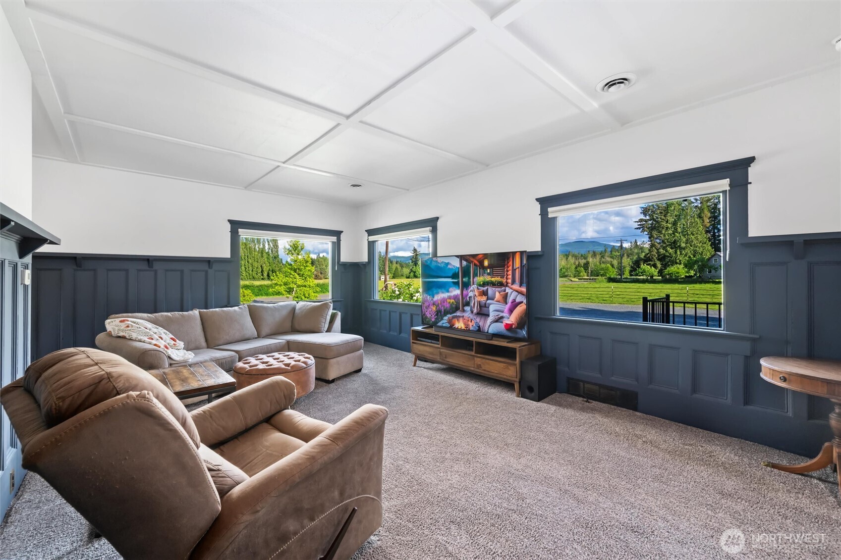 5875 Sand Road Bellingham, WA 98226 - Photo 13 of 40 a living room with furniture and a flat screen tv