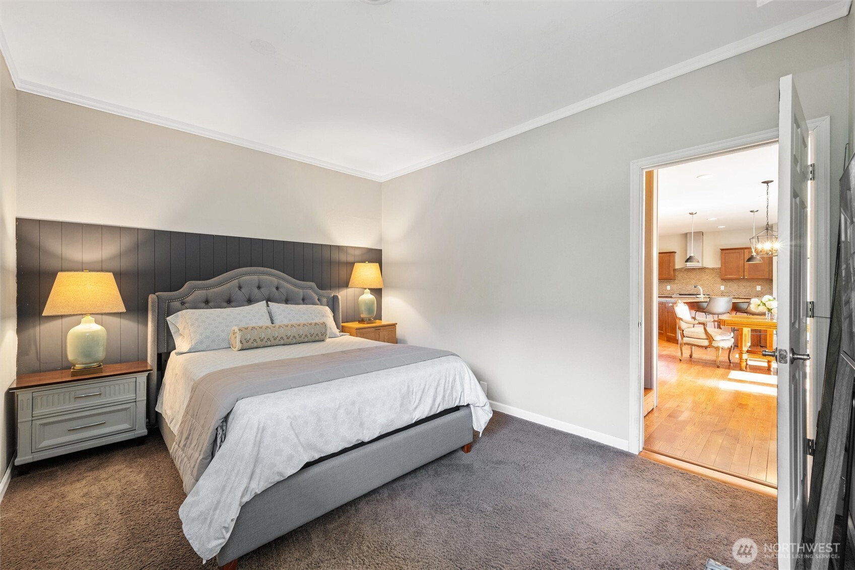 5875 Sand Road Bellingham, WA 98226 - Photo 15 of 40 a bedroom with a bed and wooden floor