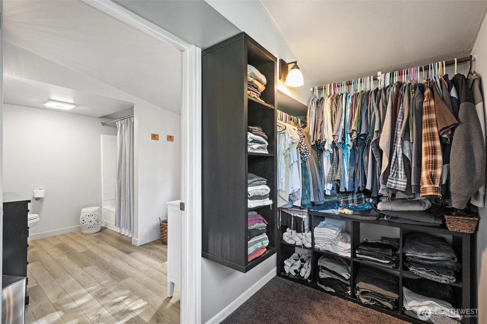 5875 Sand Road Bellingham, WA 98226 - Photo 20 of 40 a view of walk in closet with clothes and shoes