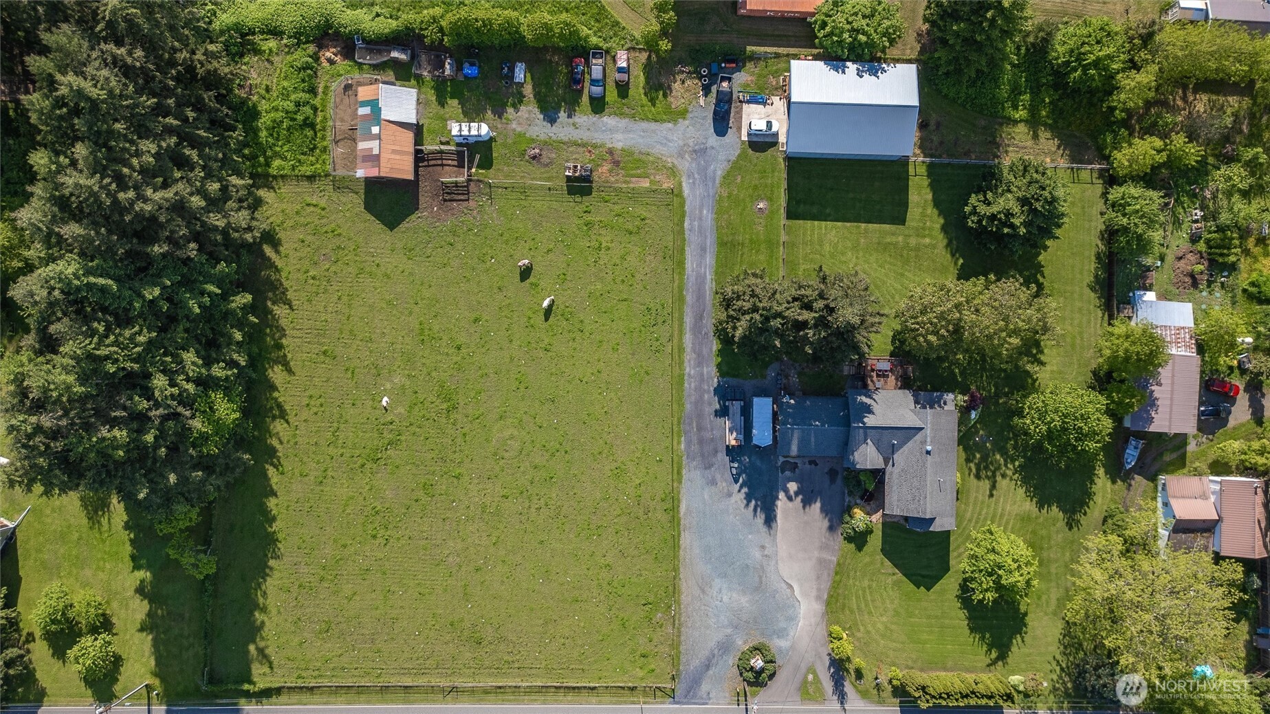 5875 Sand Road Bellingham, WA 98226 - Photo 3 of 40 an aerial view of a house with swimming pool garden and patio