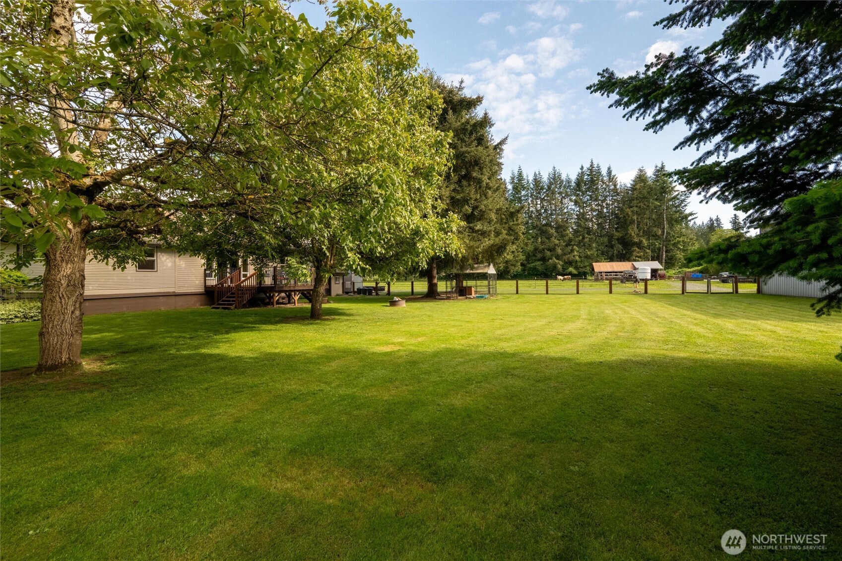 5875 Sand Road Bellingham, WA 98226 - Photo 32 of 40 a view of yard with swimming pool and trees