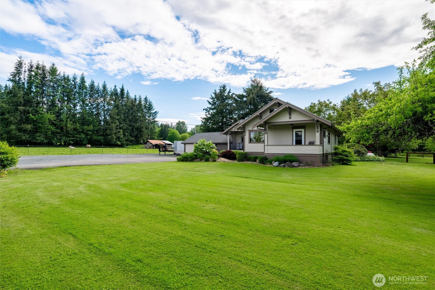 5875 Sand Road Bellingham, WA 98226 - Photo 36 of 40 a front view of house with yard and green space