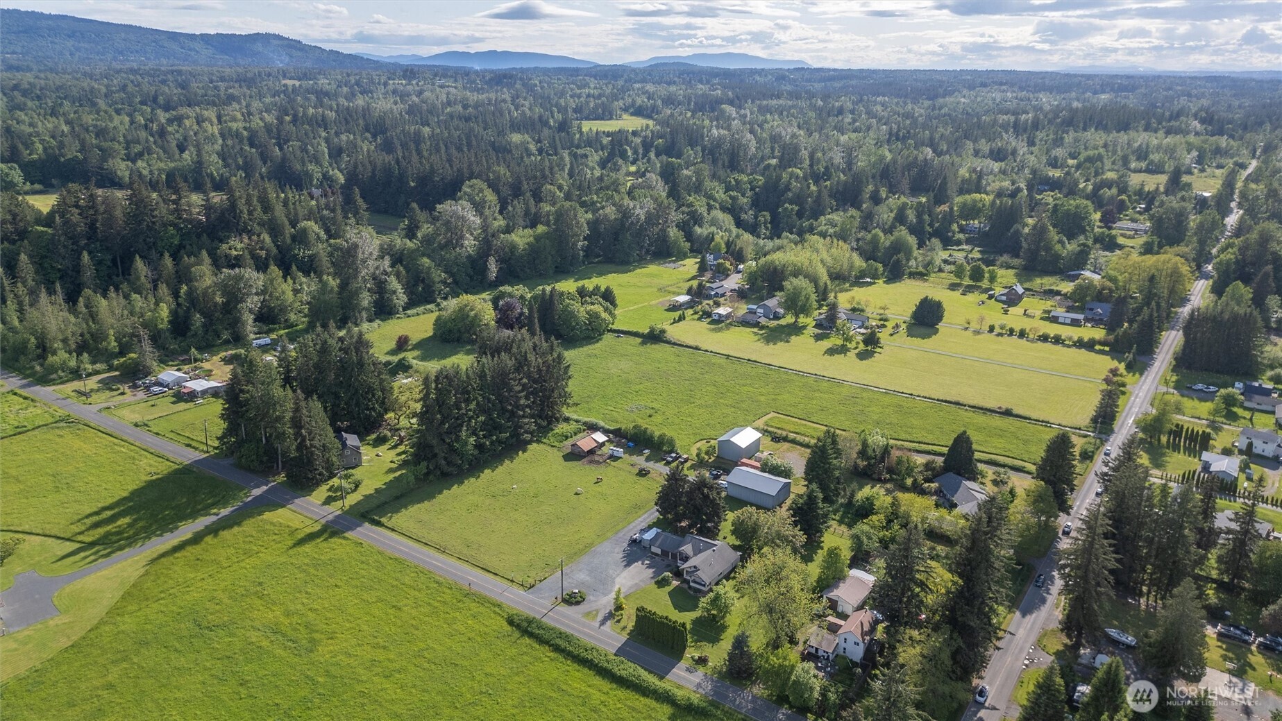 5875 Sand Road Bellingham, WA 98226 - Photo 4 of 40 a view of a field with an ocean