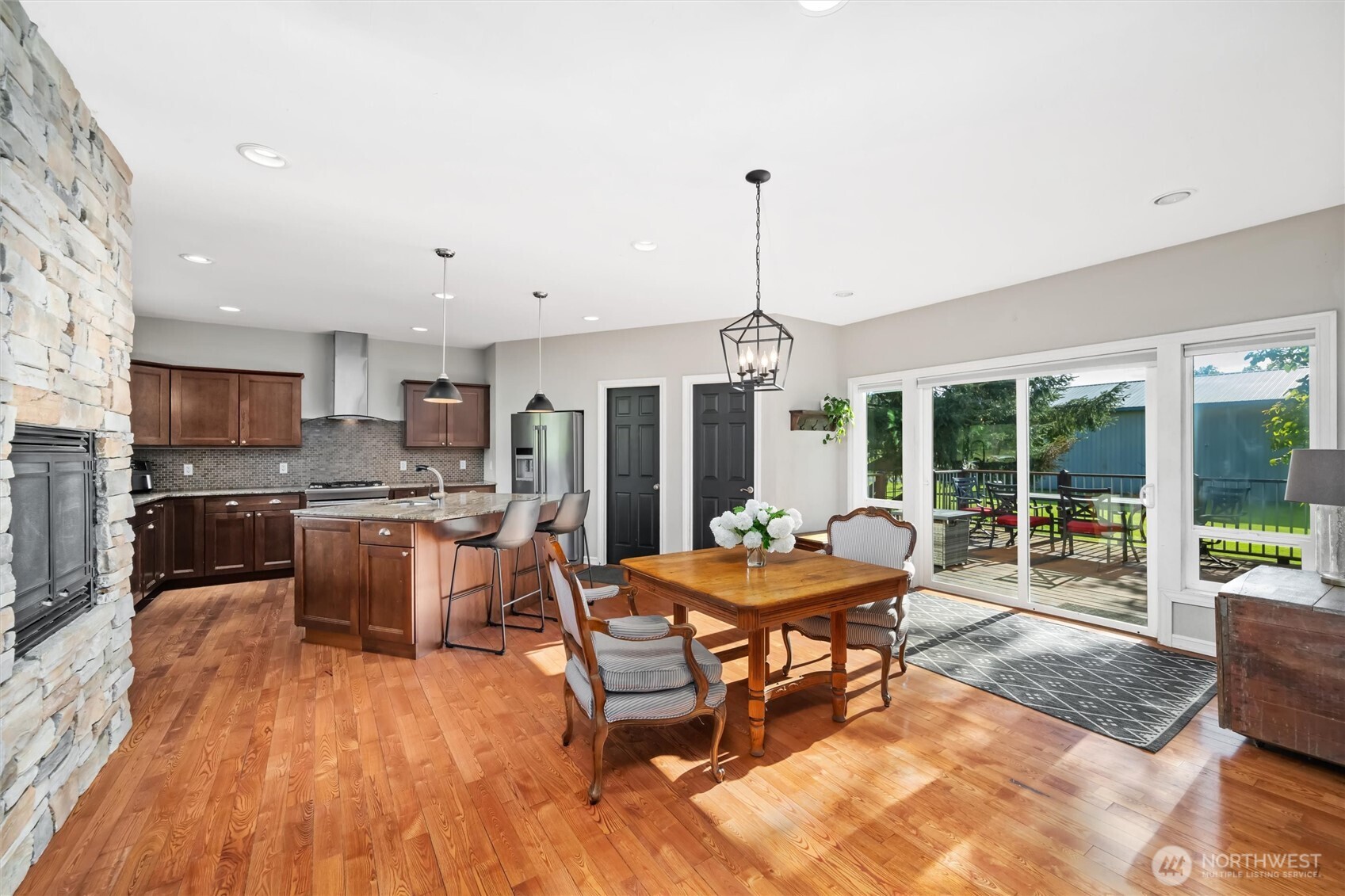 5875 Sand Road Bellingham, WA 98226 - Photo 7 of 40 a outdoor space with furniture and wooden floor